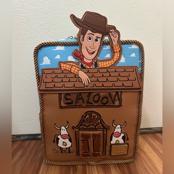 NWT Loungefly Disney Toy Story 30th anniversary Woody Saloon Backpack - Picture 2 of 5